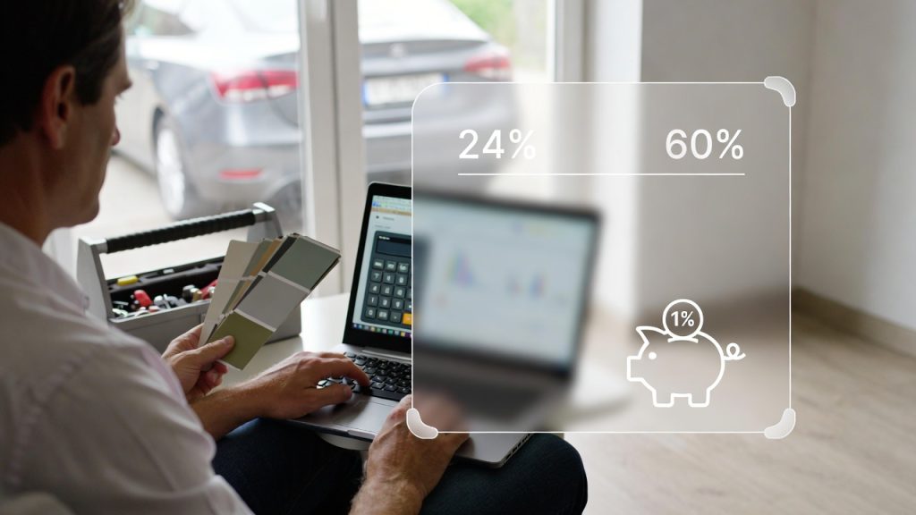 Refinancing Your Auto Loan: How It Could Save You Hundreds Each Month Man holding color swatches and analyzing refinancing benefits on a laptop.